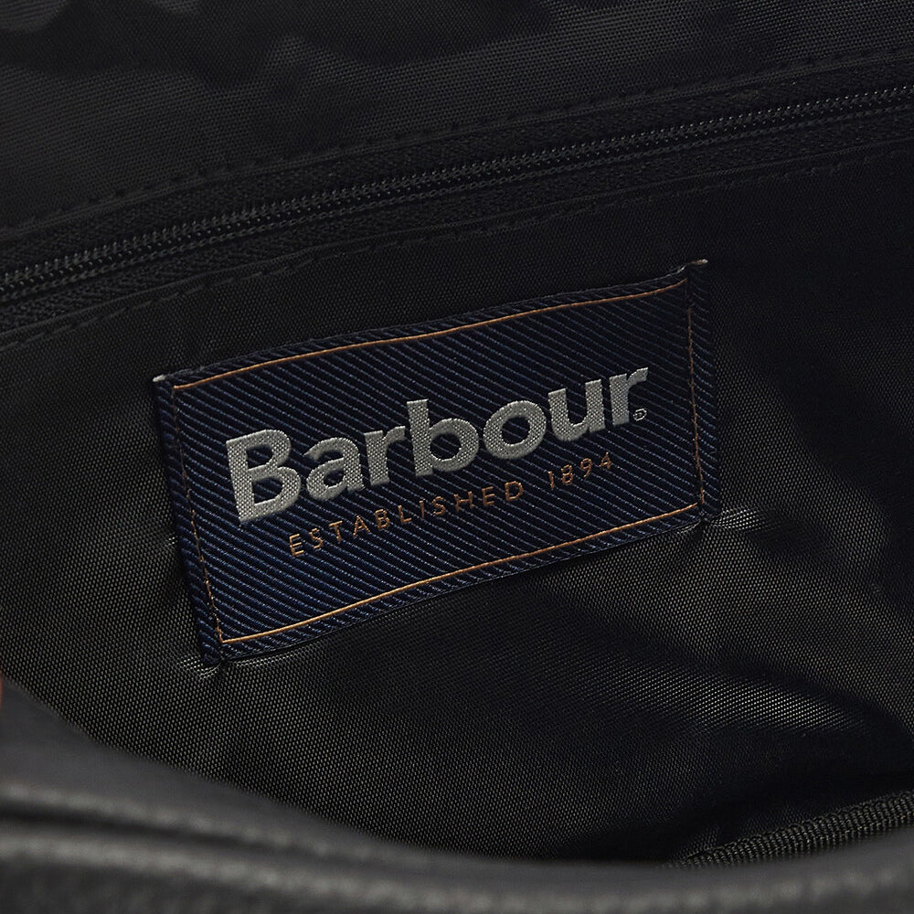 Barbour HIGHGATE LEATHER Mens Wash Bag Black interior label detail view with logo on polyester lining.