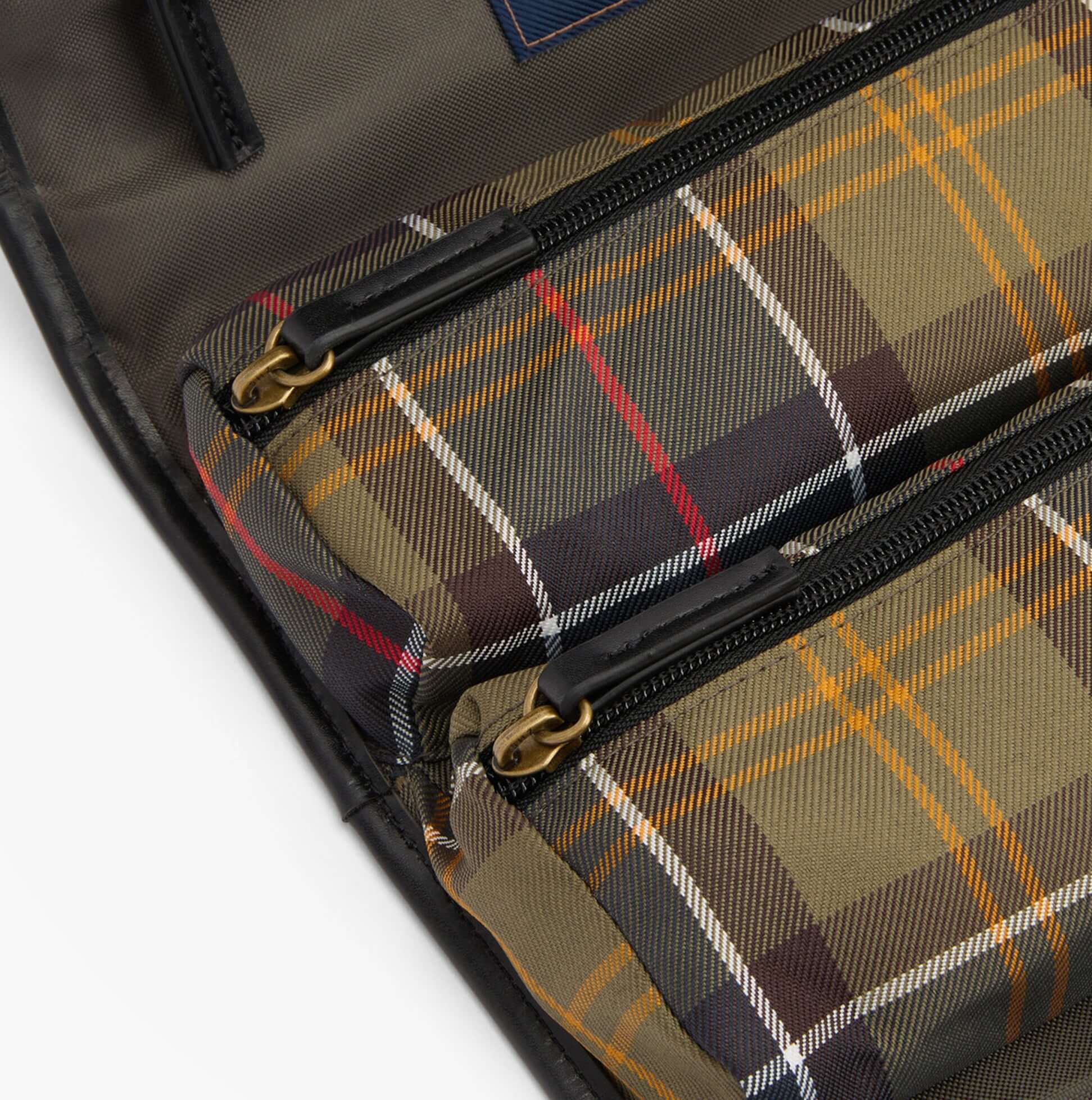 Barbour TARTAN HANGING Mens Washbag Classic/Beacon interior detail view with multiple zippered pockets and tartan pattern.