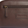 Close-up detail view of Barbour LEATHER Mens Wash Bag Dark Brown showing embossed logo and zip.