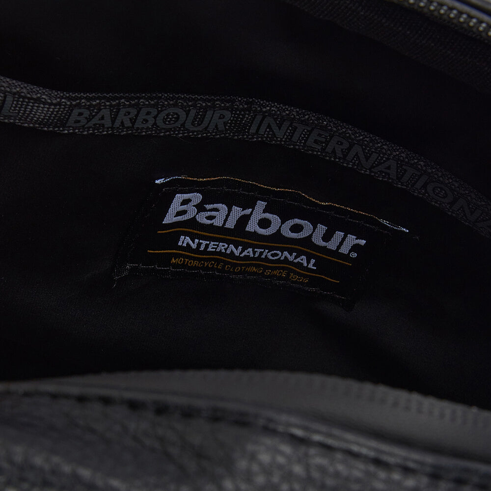Barbour BLACKWALL Mens Wash Bag Black interior view showing the Barbour logo tag and lining detail.
