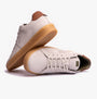 Barbour REFLECT Mens Casual Trainers Off White, side and angled view showcasing leather upper and rubber sole.