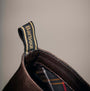 Barbour HALE Mens Chelsea Boots Dark Brown detail view of the pull tab with brand logo.