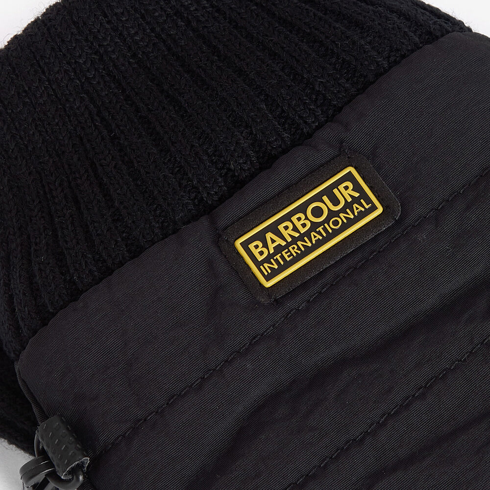 Barbour PEAK LEGACY GLOVES Mens Black detail view showing contrasting logo badge on cuff.