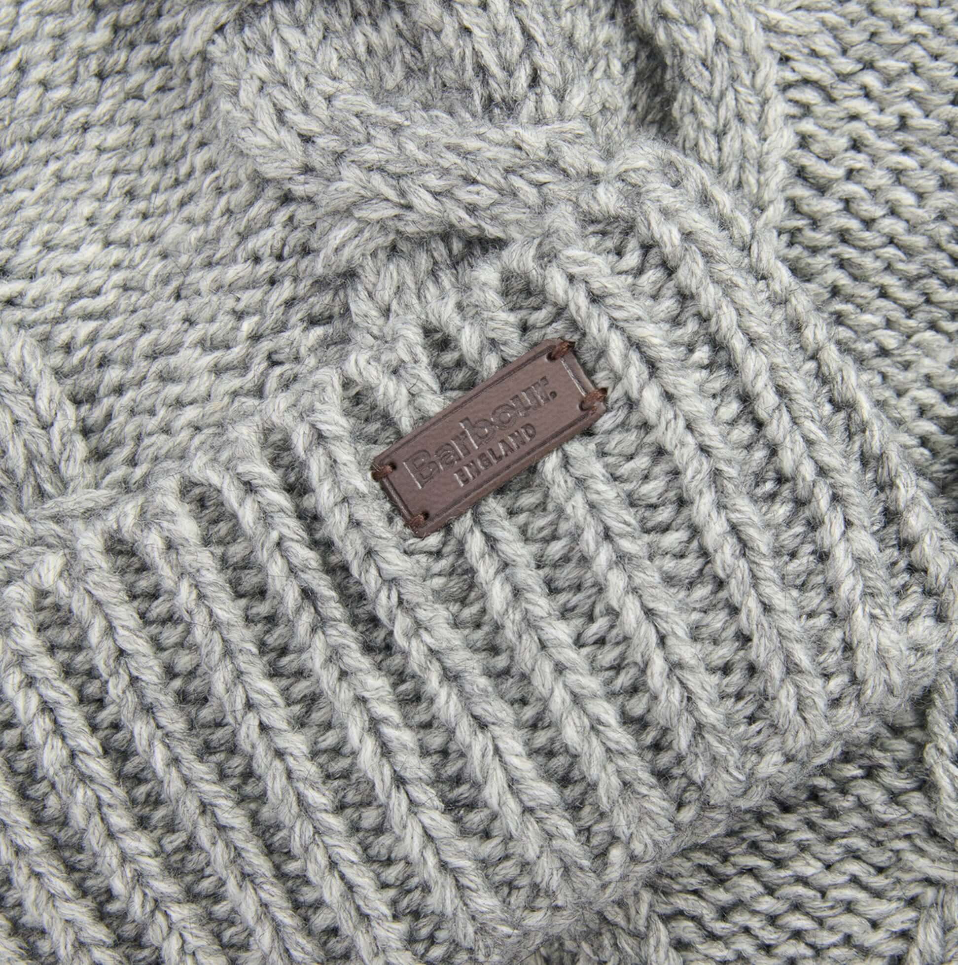 Barbour JESMOND BEANIE AND SCARF Gift Set Mens Mid Grey close-up detail view showcasing texture and brand label.