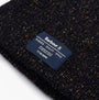 Barbour ESTON Mens Beanie Navy detail view featuring the label and textured fabric.