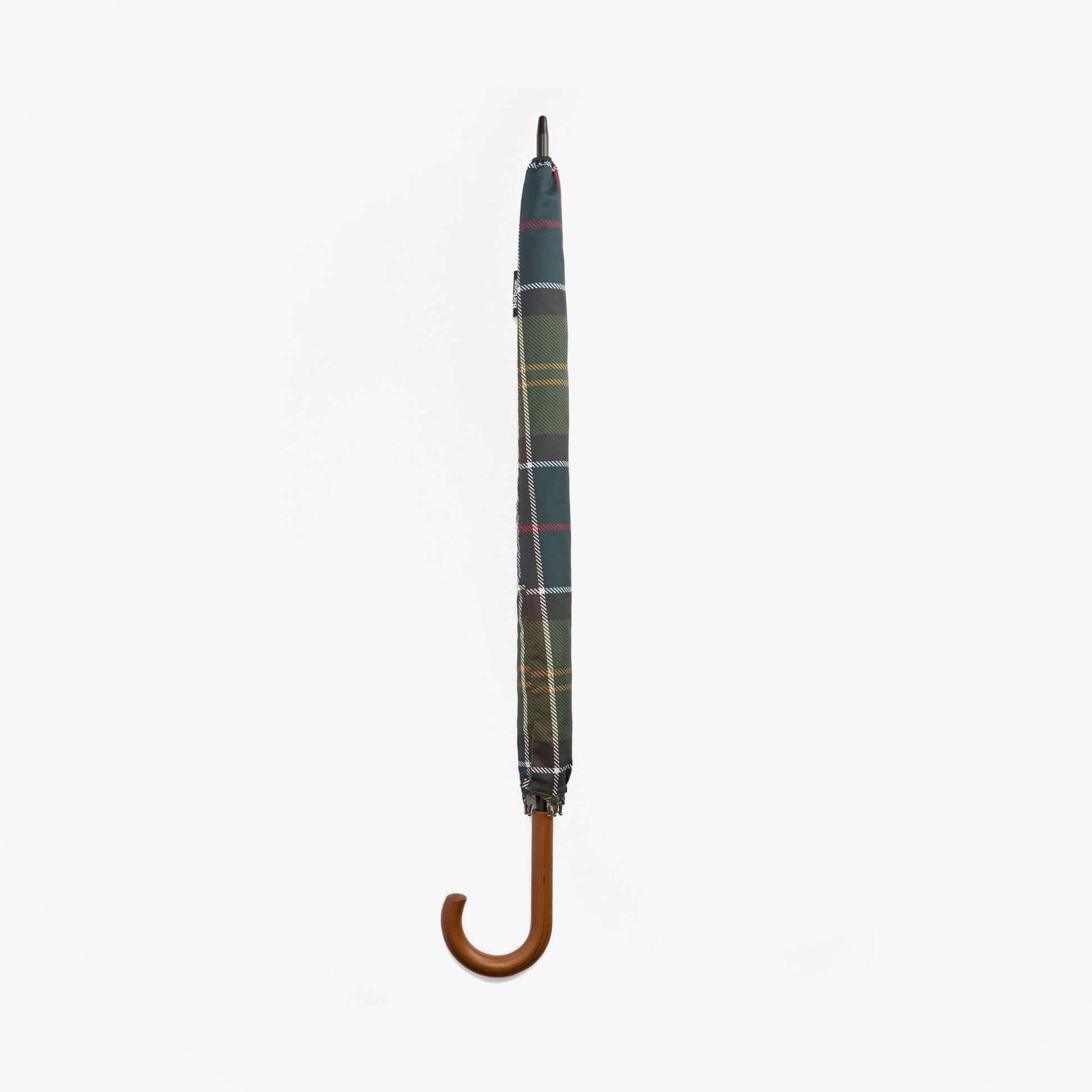Barbour MIXED TARTAN Umbrella Mixed Tartan side view of closed umbrella with tartan pattern and wood handle.