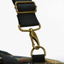 Barbour TORRIDON TARTAN Holdall Bag Classic Tartan detail view of strap fastening with metal clip.