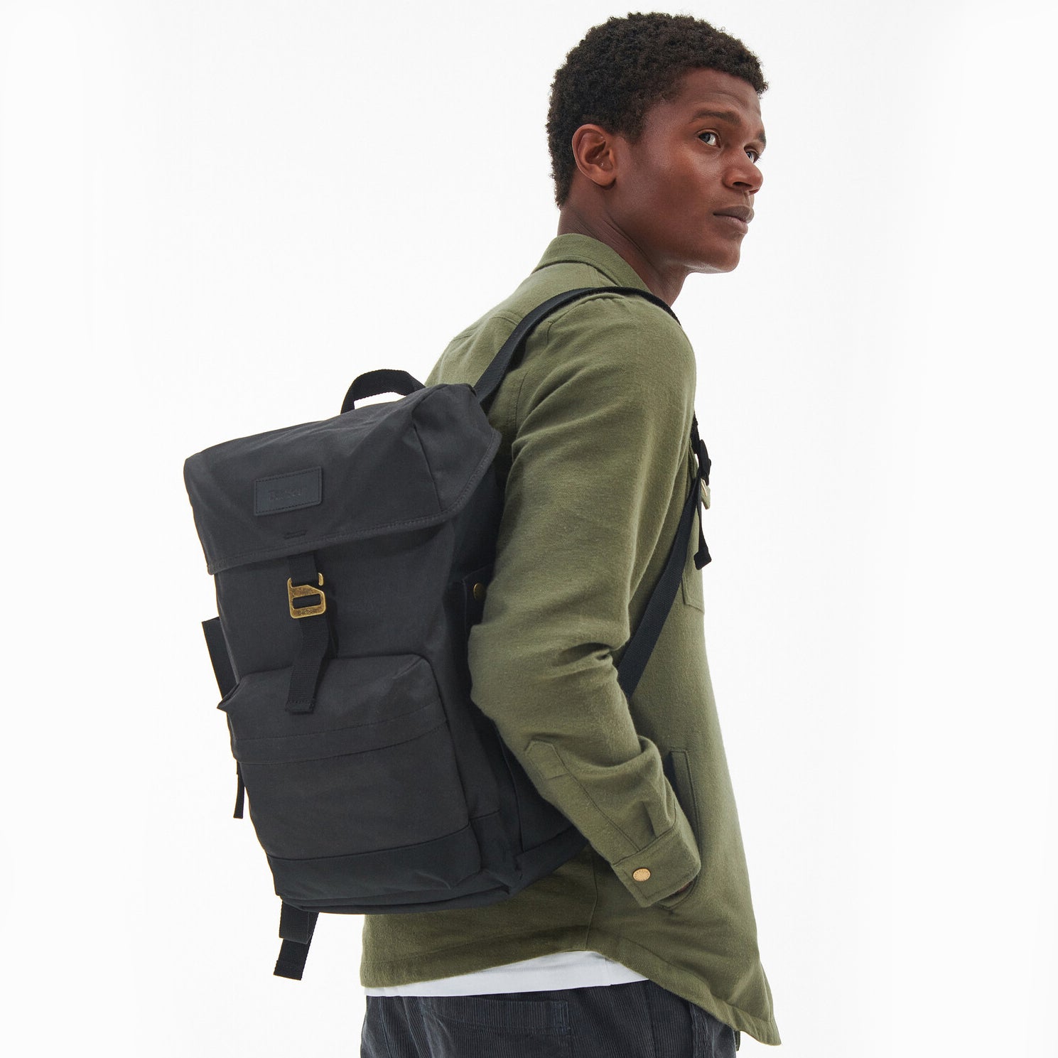 Barbour ESSENTIAL WAX BACKPACK Unisex Adults Backpack Black side view worn by model