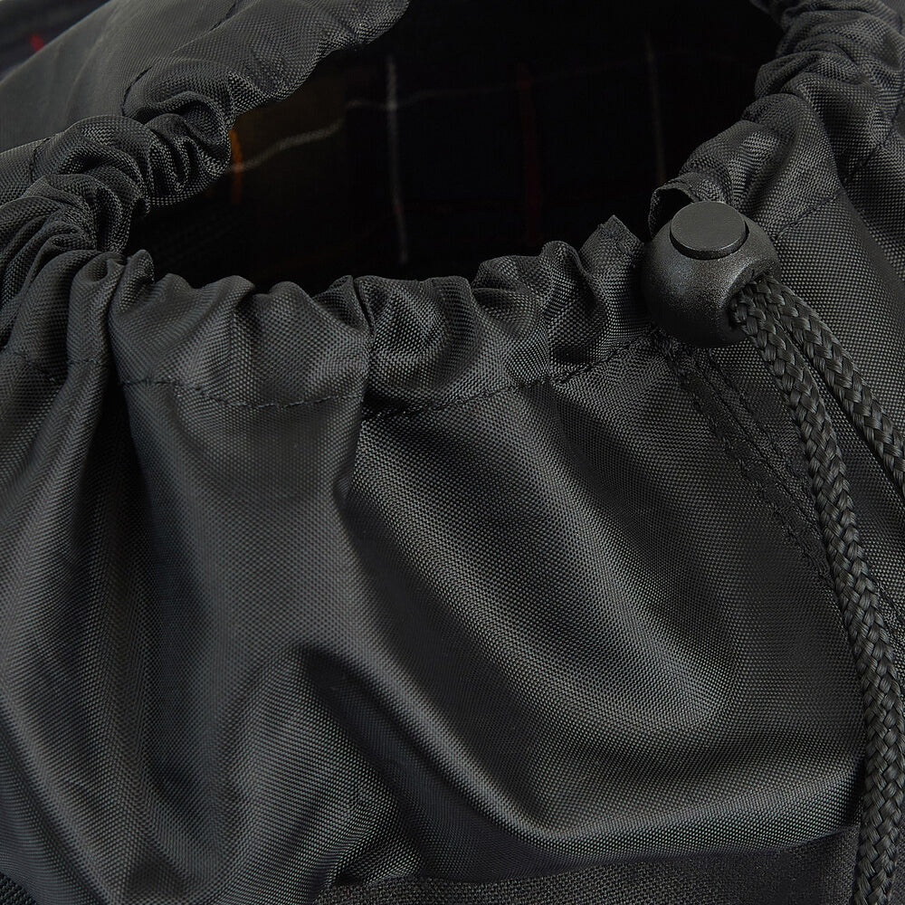 Barbour ESSENTIAL WAX BACKPACK Unisex Adults Backpack Black detail view of drawcord opening and closure.