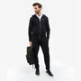 Barbour HIGHFIELD CANVAS BACKPACK Unisex Adults Canvas Backpack Navy/Olive side view with model wearing a black outfit.
