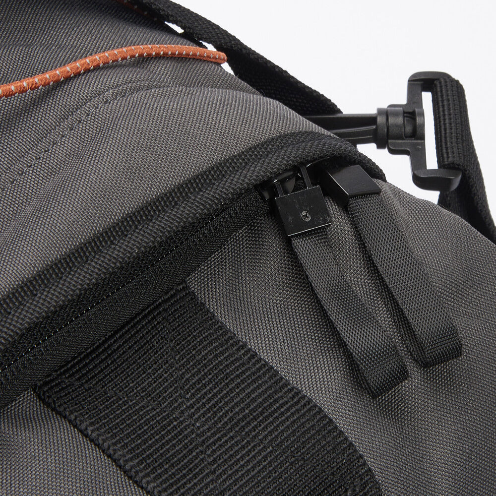 Detail view of Barbour ARWIN CANVAS Unisex Adults Duffle Bag Charcoal/Ginger showing zipper and strap features.