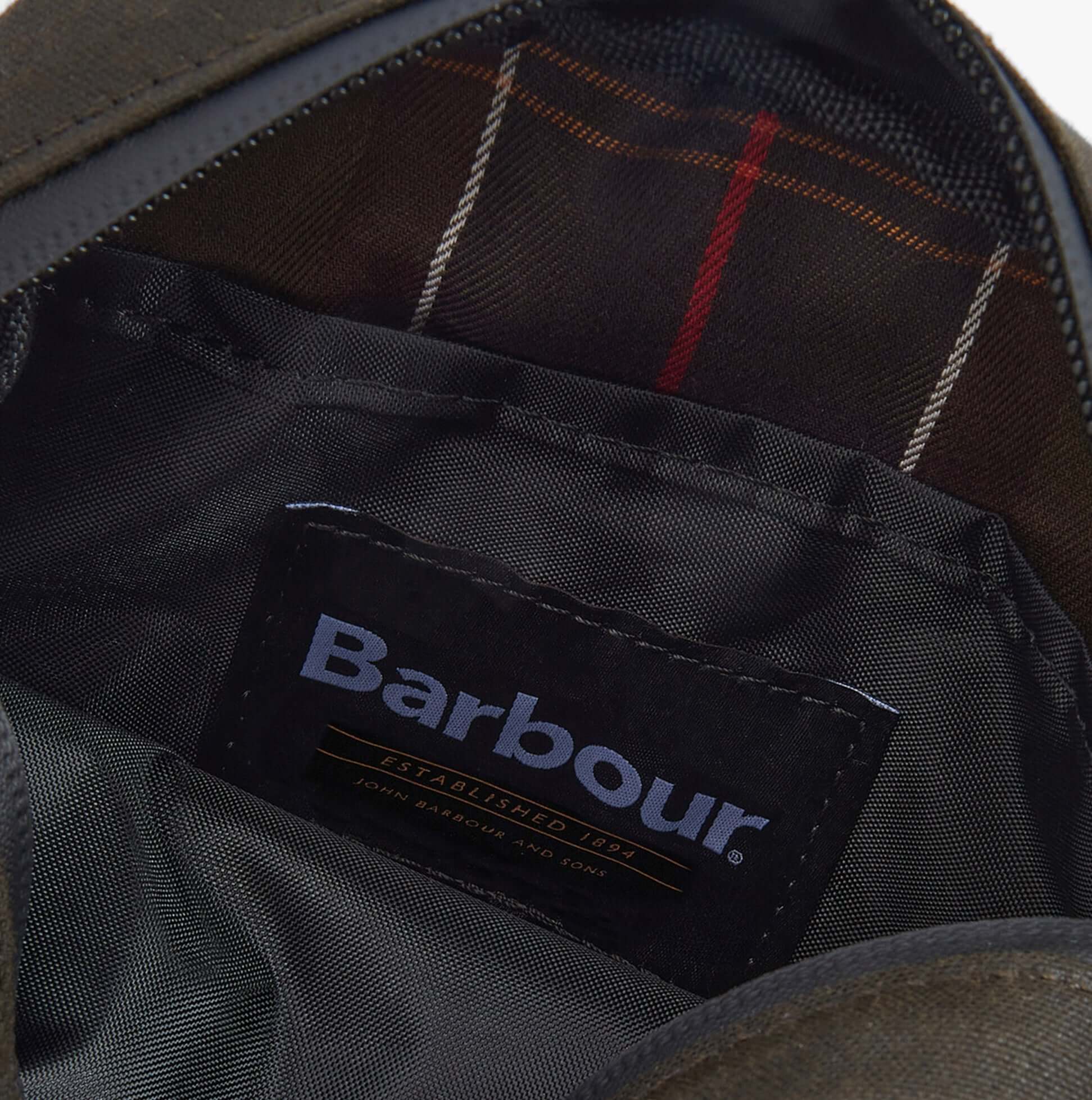 Barbour FIELD WAX Mens Crossbody Bag Olive/Black interior view showing lining and label details.