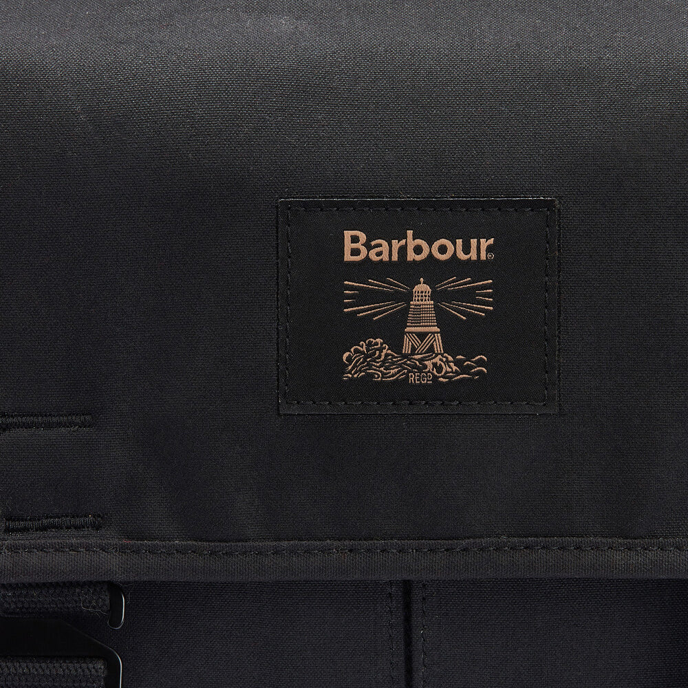 Barbour FIELD WAX Unisex Adults Messenger Bag Black detail view of logo on front flap