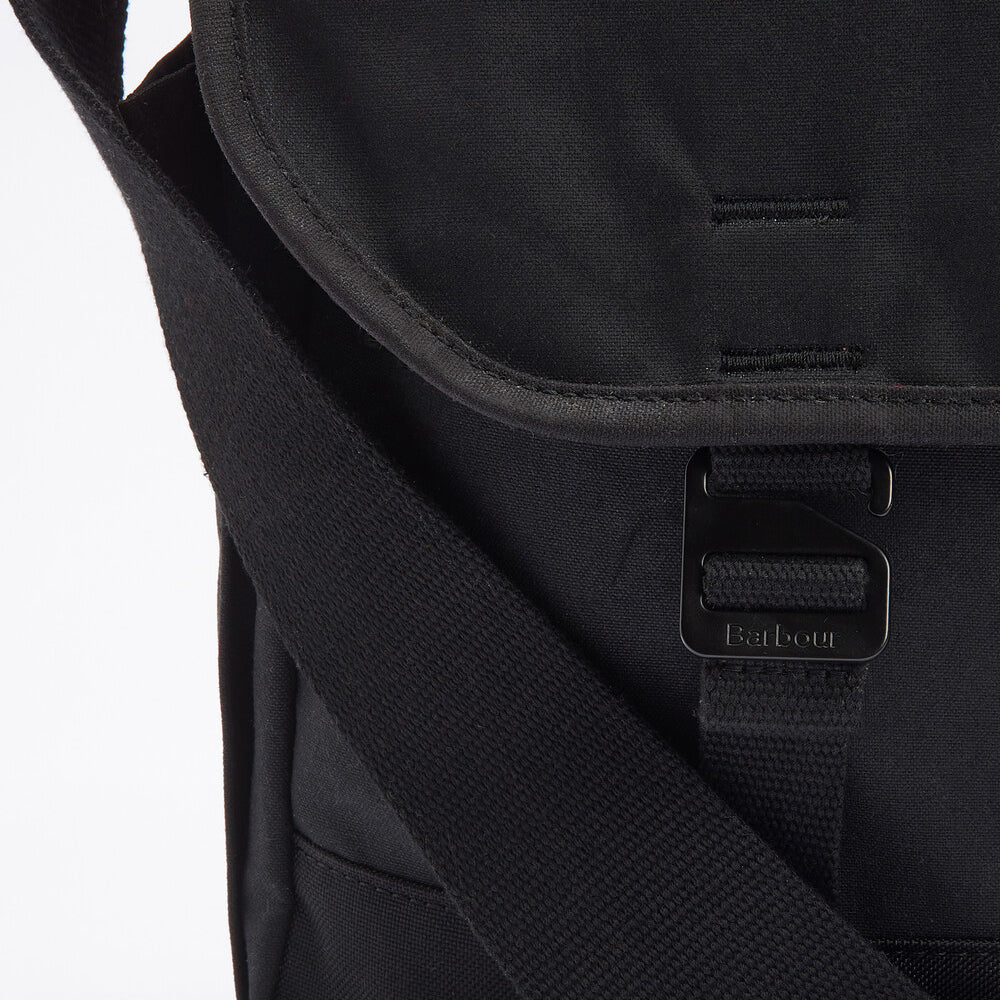 Detail view of Barbour FIELD WAX Unisex Adults Messenger Bag Black showing buckle closure and adjustable strap.