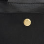 Barbour FIELD WAX Unisex Adults Messenger Bag Black detail view showing closure and branding.