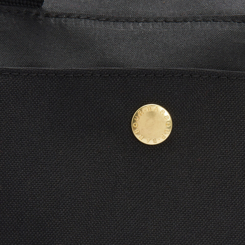Barbour FIELD WAX Unisex Adults Messenger Bag Black detail view showing closure and branding.
