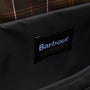 Detail view of Barbour FIELD WAX Unisex Adults Messenger Bag Black interior with brand tag.