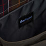 Detail view of Barbour FIELD WAX Unisex Adults Messenger Bag Olive interior, showing brand label and lining.