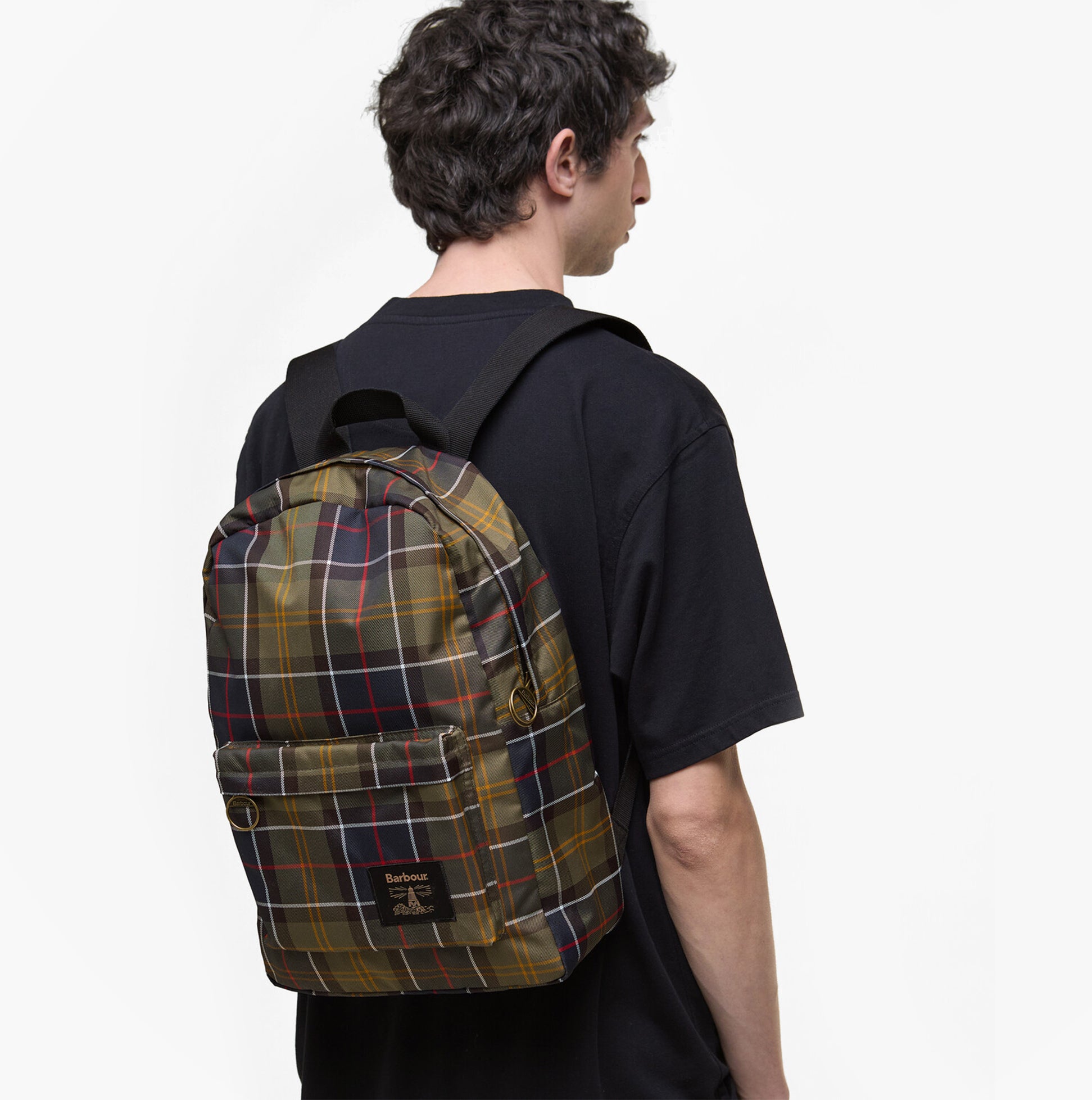 Barbour TORRIDON TARTAN Backpack Mens Backpack/Rucksack Classic Tartan side view on model with dark shirt.