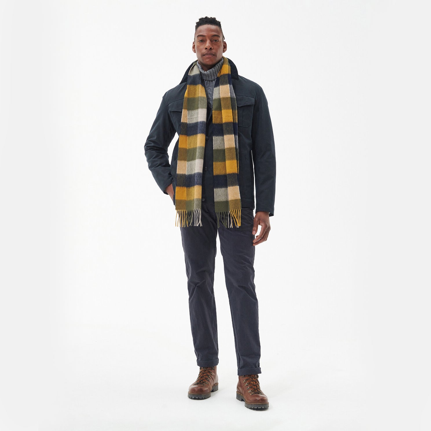 Barbour LAMBSWOOL TATTERSALL Scarf Unisex Adults Forest Mist on model, front view, showcasing design and color.