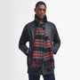 Barbour NEW CHECK Unisex Adults Tartan Scarf Black Stewart worn by model in front view, showcasing the checked pattern and tasselled hem.