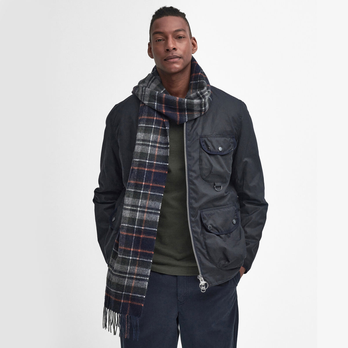Barbour NEW CHECK Unisex Adults Tartan Scarf Navy/Dark Ginger displayed on a model in a front view, featuring an all-over checked pattern.