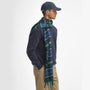 Barbour YAXLEY Unisex Adults Tartan Scarf Green Loch wrapped around a model's neck, side view.