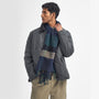 Barbour WESTERDALE Scarf Unisex Adults Green Loch front view worn by model with quilted jacket.