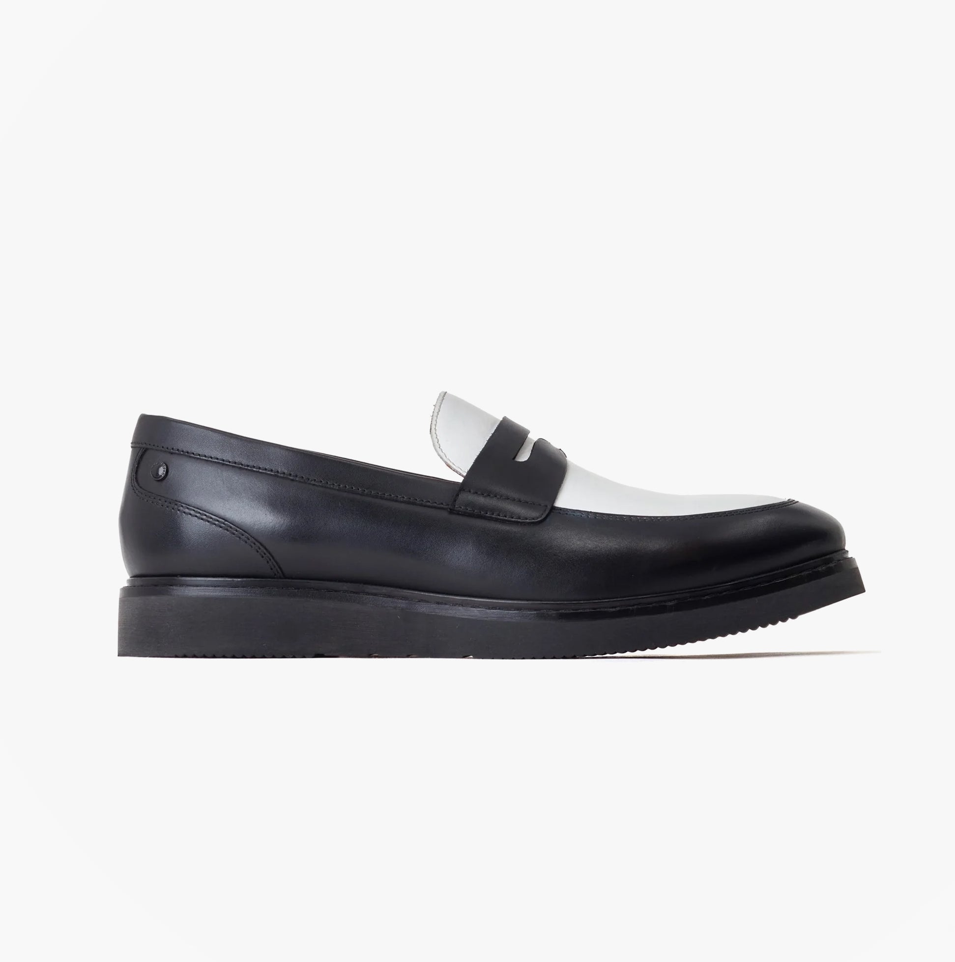 Base London SID Mens Shoes Black side view of black leather loafers with white detail.