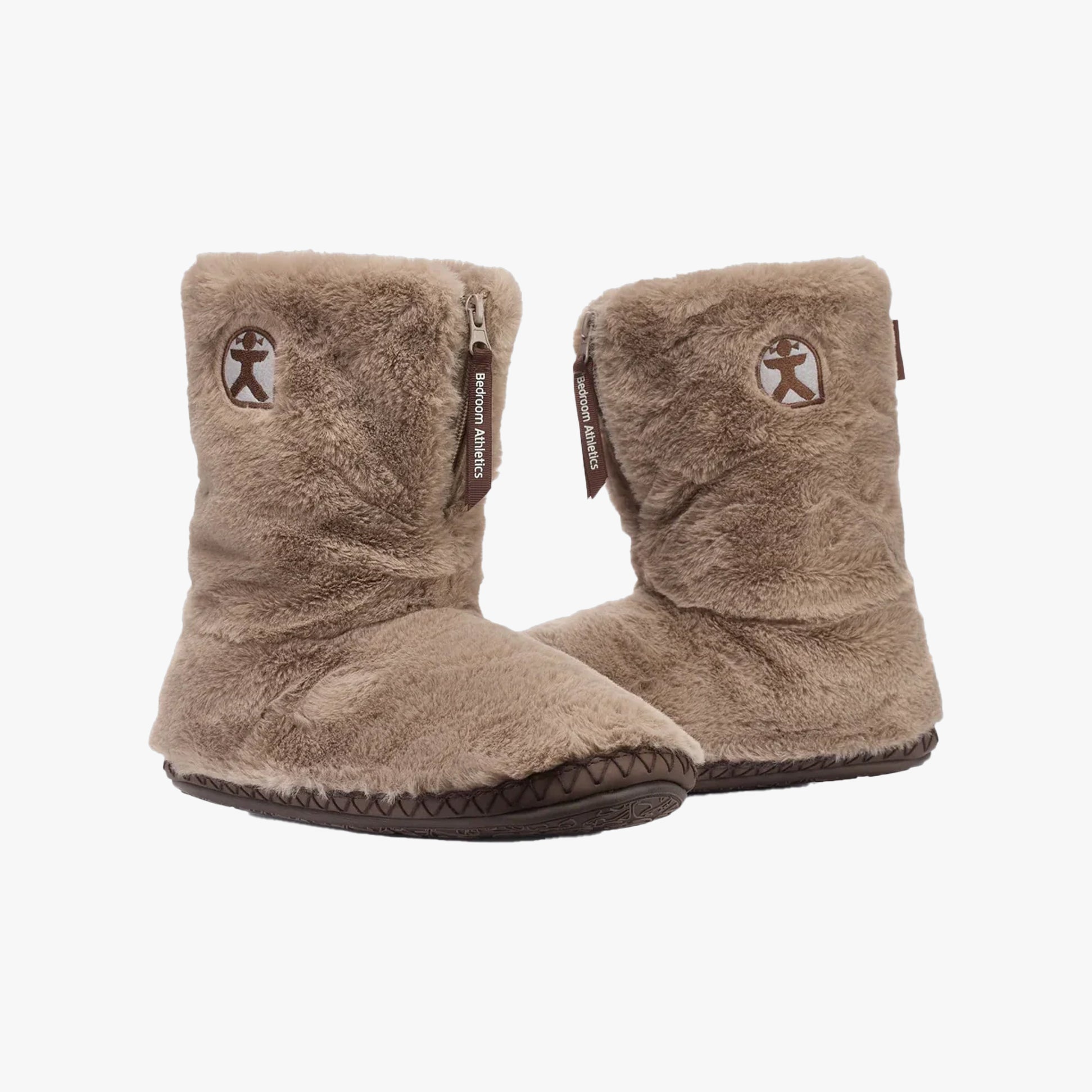 Bedroom Athletics MONROE Womens Slipper Boots Taupe / Deep Taupe side view showcasing soft faux fur upper and round toe design.