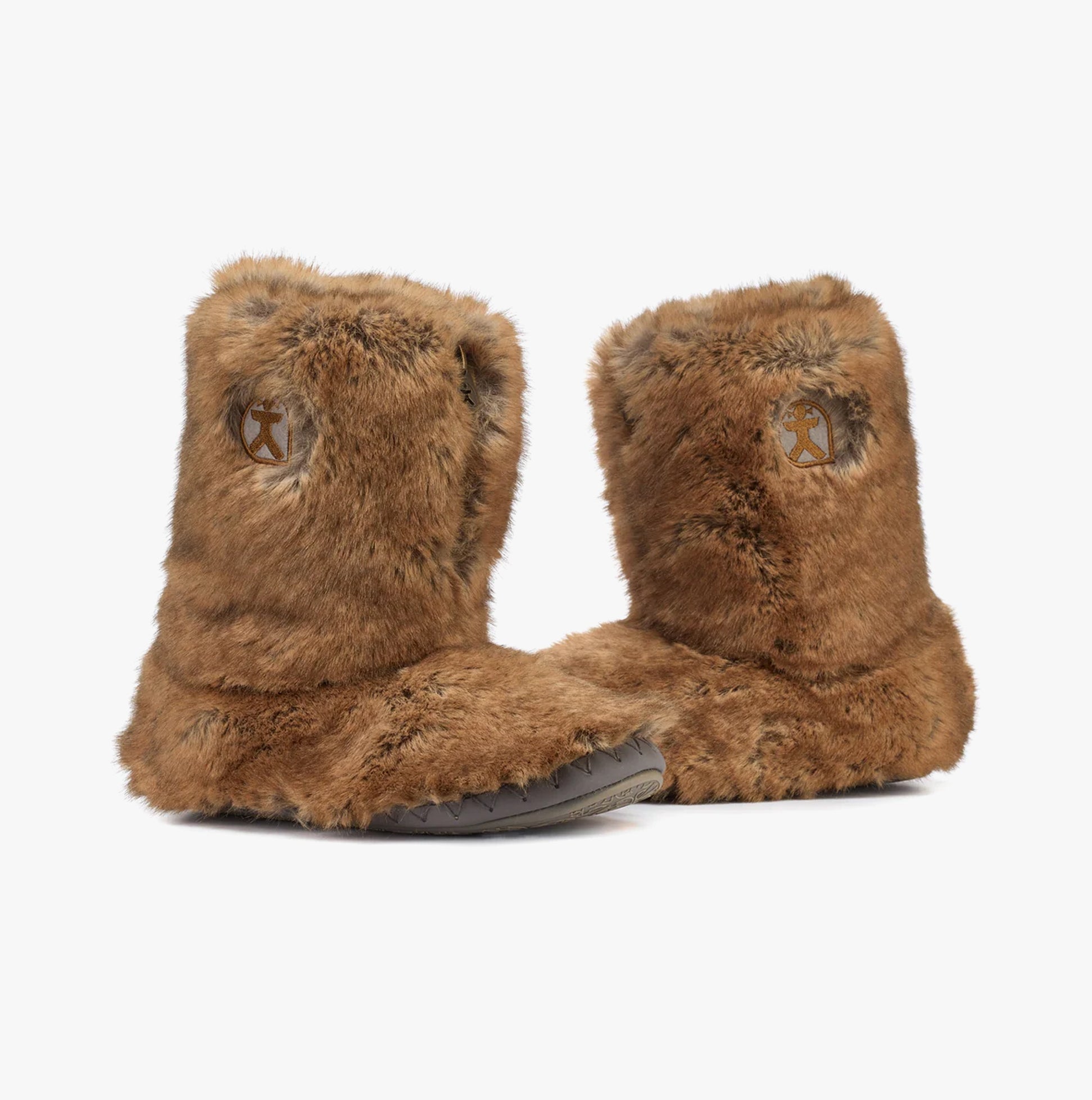 Bedroom Athletics COLE Womens Slipper Boots Weasel side view of faux fur slipper boots with rubber sole