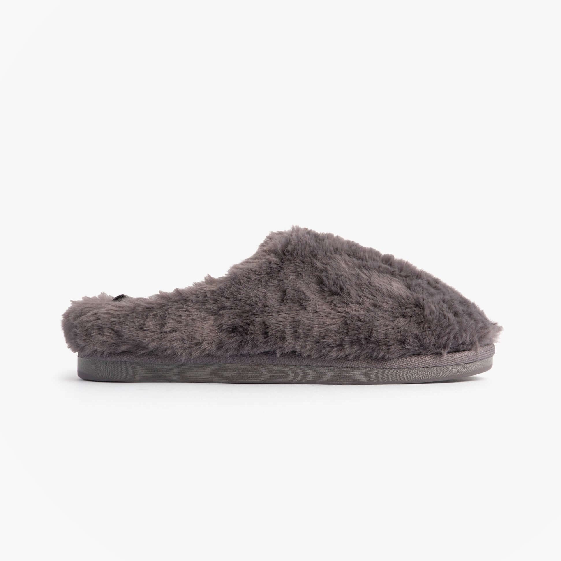 Bedroom Athletics ARIANA Womens Mule Slippers Ink side view showing faux fur upper and flat sole