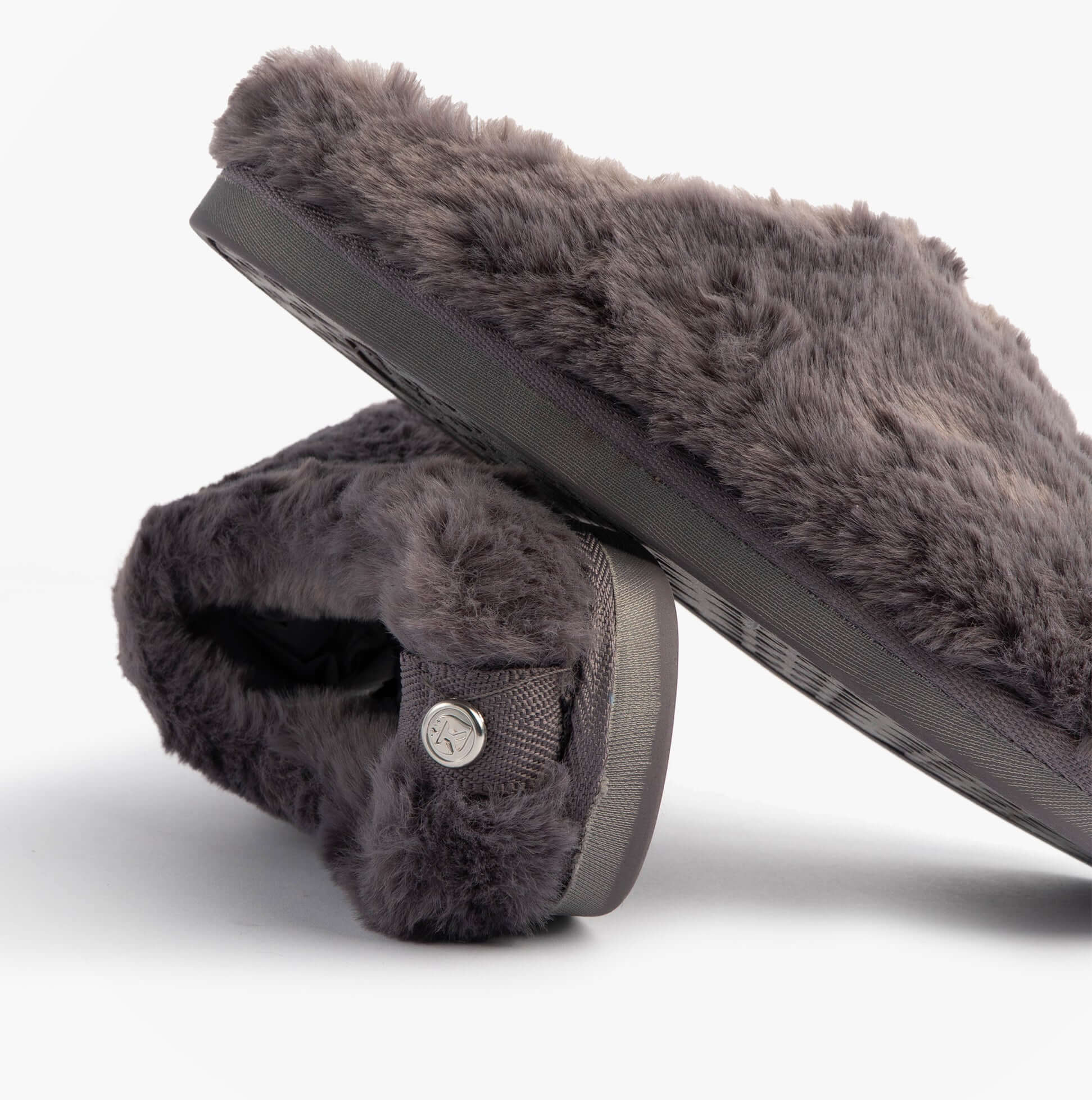 Bedroom Athletics ARIANA Womens Mule Slippers Ink side view showcasing faux fur upper and flat sole.