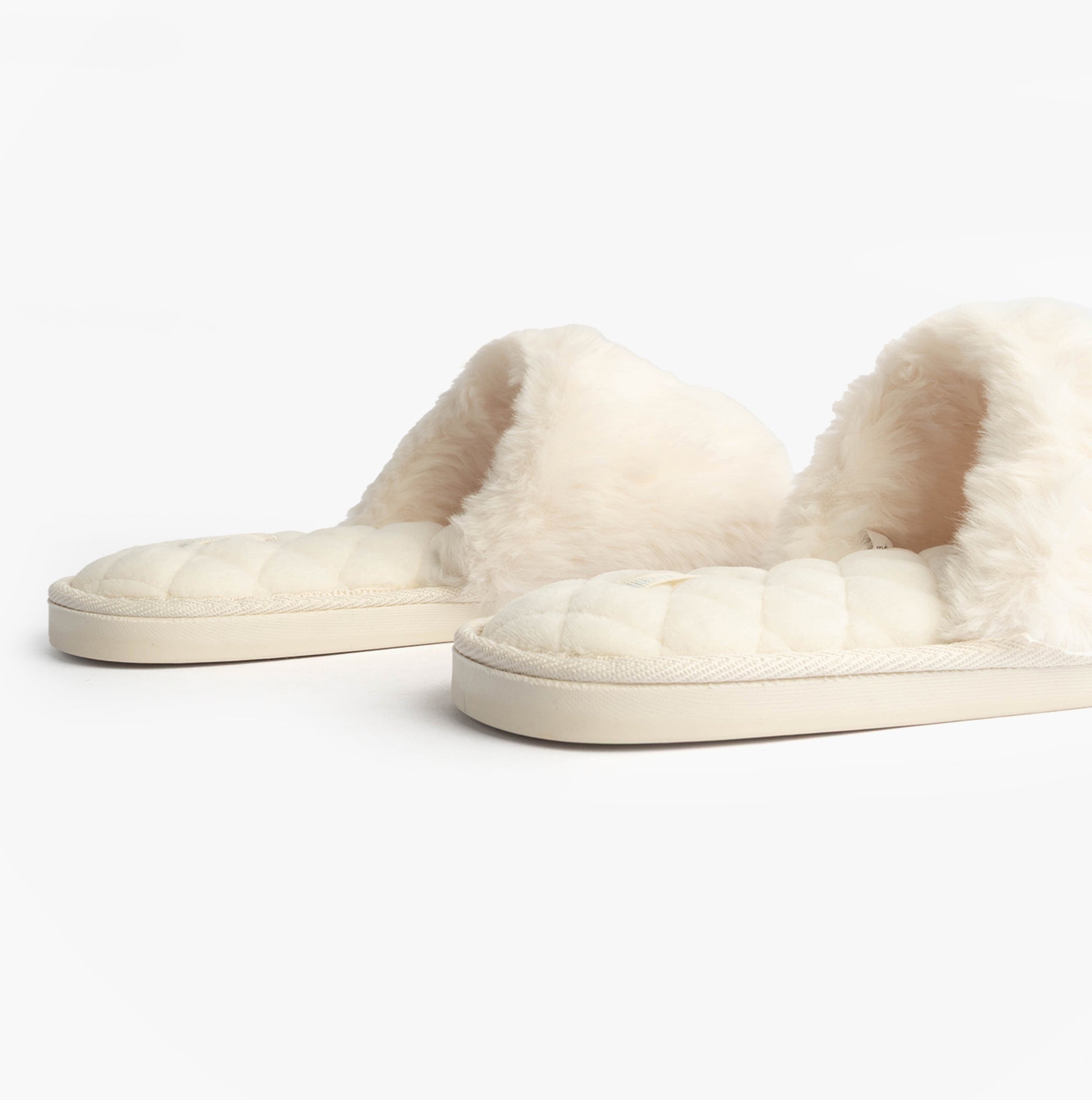 Bedroom Athletics ERIN Womens Slipper Sliders Cream side view showcasing faux fur upper and comfortable slip-on design.