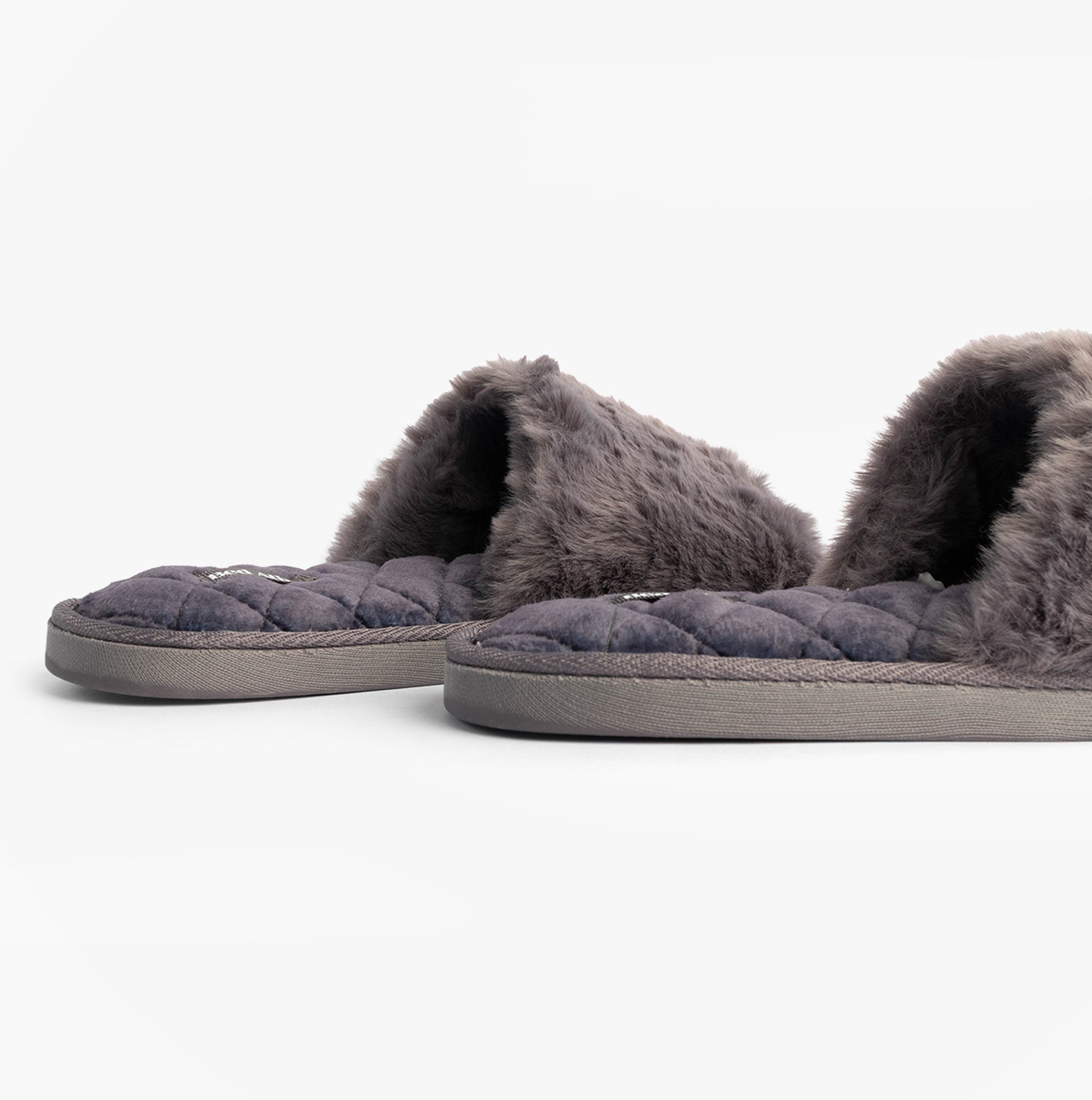 Bedroom Athletics ERIN Womens Slipper Sliders Ink side view showing faux fur upper and rubber soles.