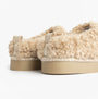 Bedroom Athletics ALICIA Womens Mule Slippers Biscuit side view showing soft faux fur material and rubber sole.