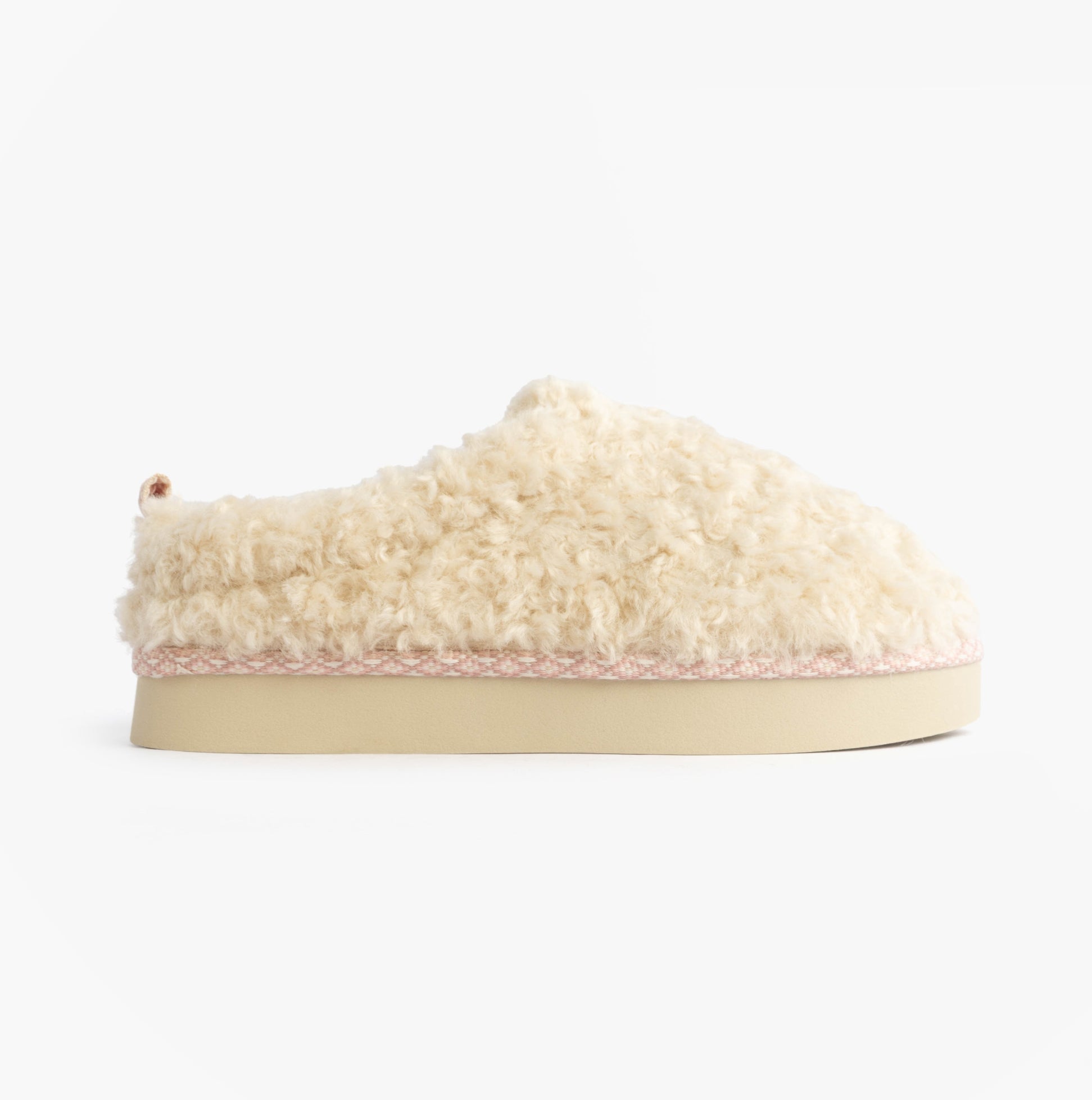 Bedroom Athletics ALICIA Womens Mule Slippers Cream side view showcasing faux fur upper and rubber sole.