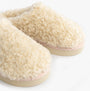 Bedroom Athletics ALICIA Womens Mule Slippers Cream detail view showcasing plush faux fur upper and rubber sole.