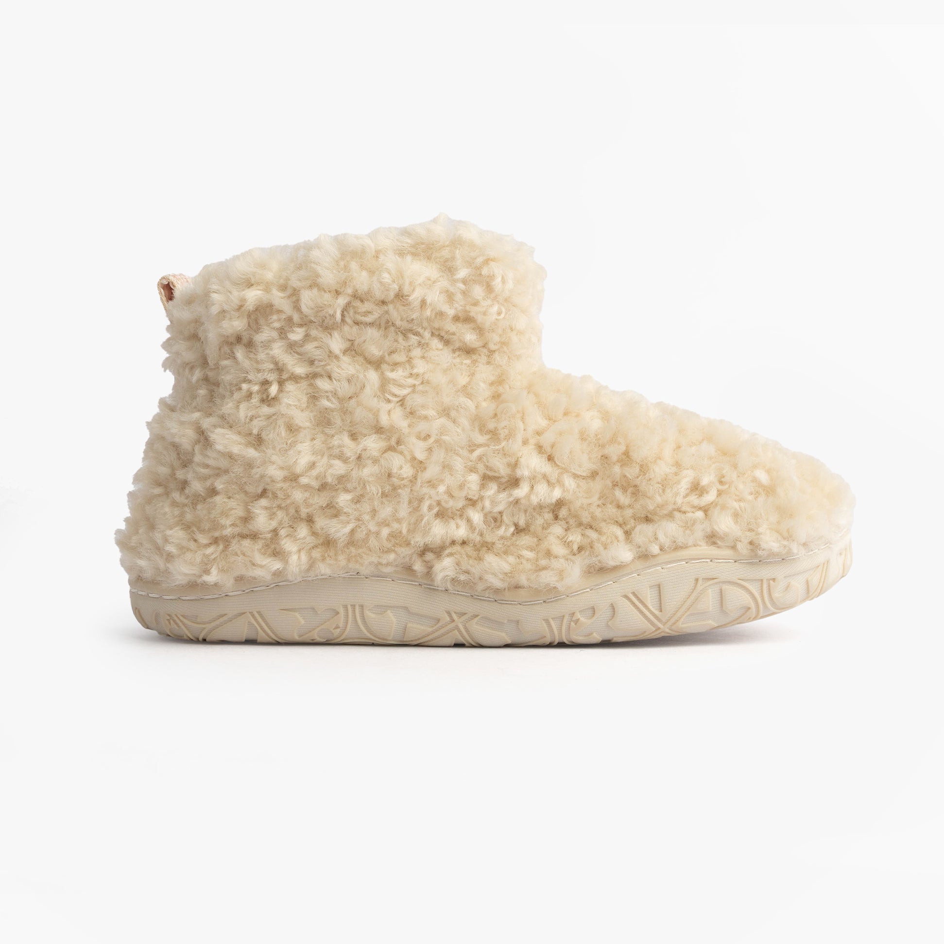 Bedroom Athletics LAUREN Womens Slipper Boots Cream side view showing faux fur upper and synthetic sole.