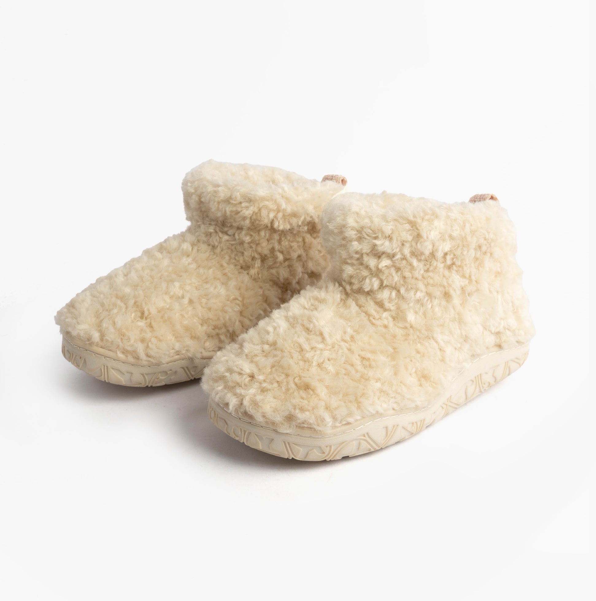 Bedroom Athletics LAUREN Womens Slipper Boots Cream side view showing faux fur upper and synthetic sole.