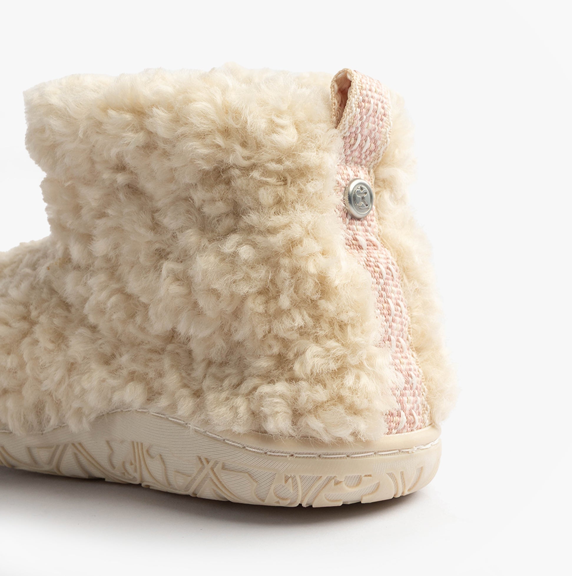 Bedroom Athletics LAUREN Womens Slipper Boots Cream side view showing faux fur texture and detailing.