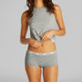 Calvin Klein ICON LOGO 3 Pack Womens Hipster Panties Black/White/Grey Heather front view with model wearing grey shirt.