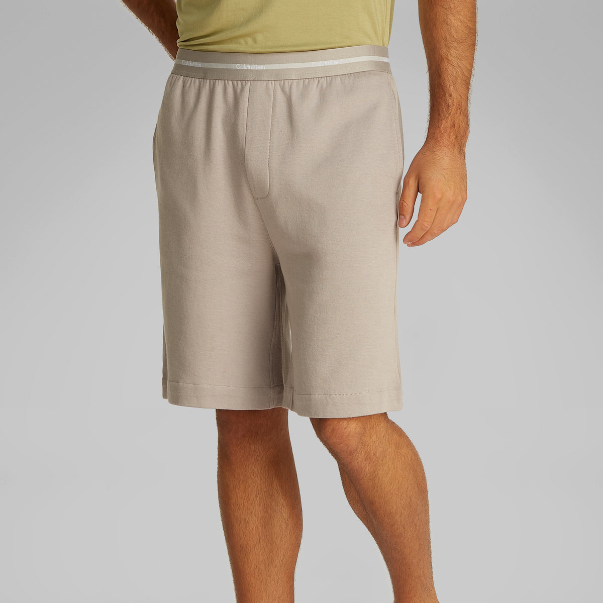 Calvin Klein MODERN TERRY Mens Lounge Shorts Ash side view showcasing comfortable cotton material and signature elastic waistband.