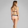 Calvin Klein INTENSE POWER Womens Bralette Papaya Punch back view showing adjustable straps and elastic waistband.