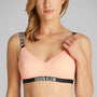 Calvin Klein INTENSE POWER Womens Bralette Papaya Punch front view, featuring soft moulded cups and adjustable straps.