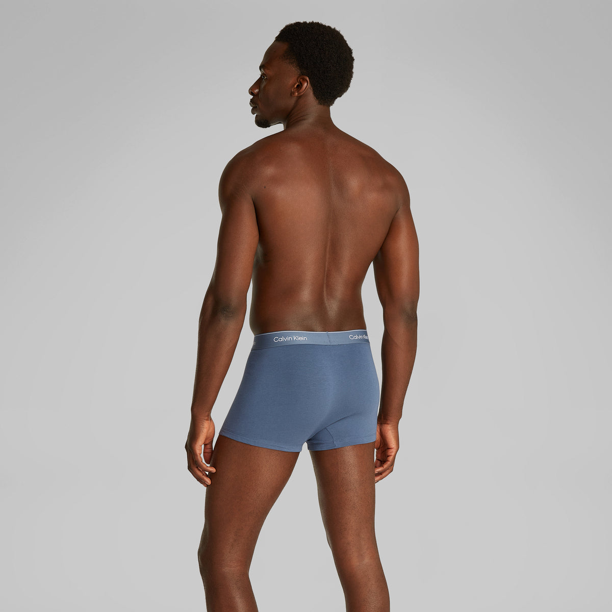 Calvin Klein ICON Cotton Stretch 3 Pack Dart Trunks Multi back view on model showcasing fit and CK signature waistband.