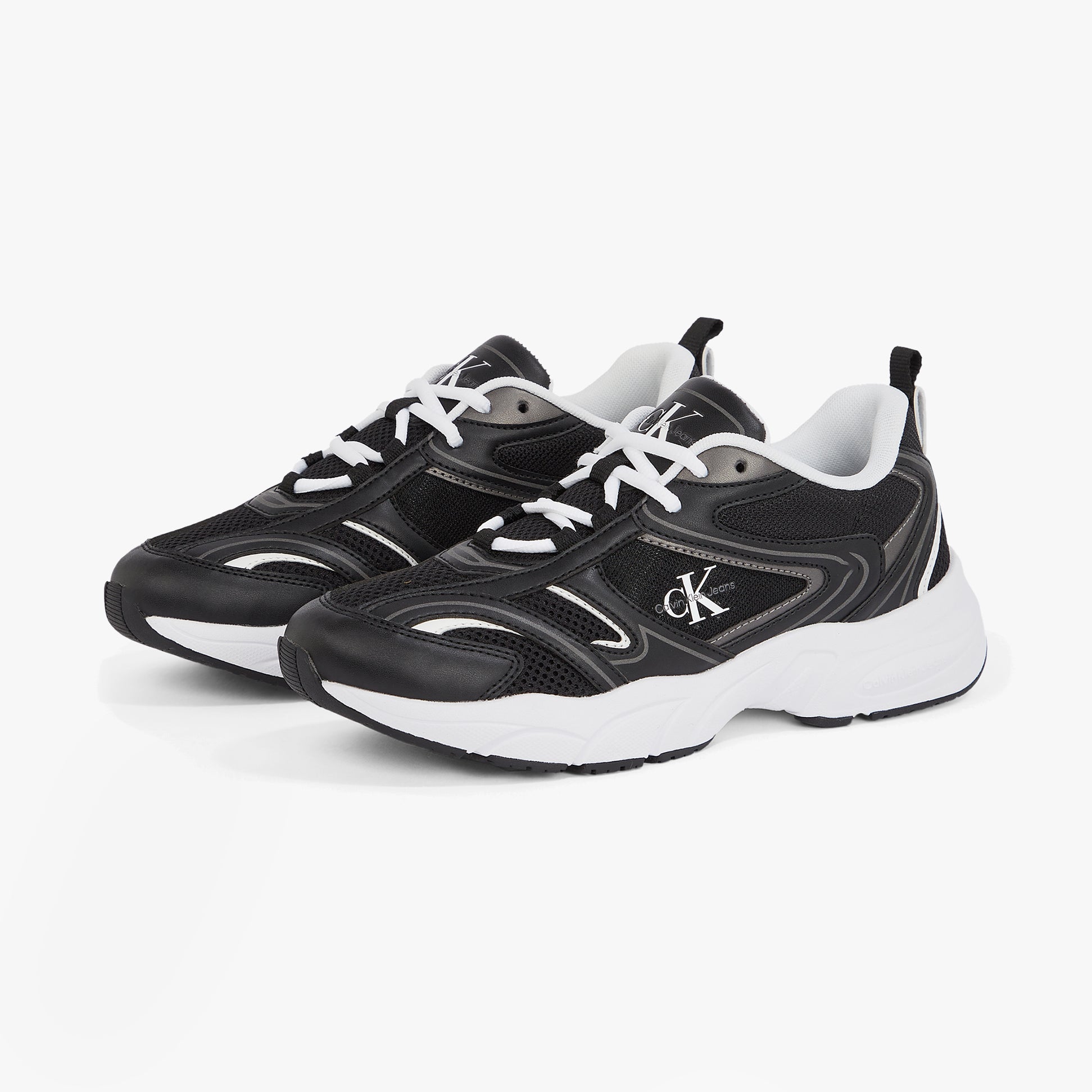 Calvin Klein RETRO TENNIS MESH Womens Trainers Black/Bright White side view showcasing stylish design and lace-up closure.