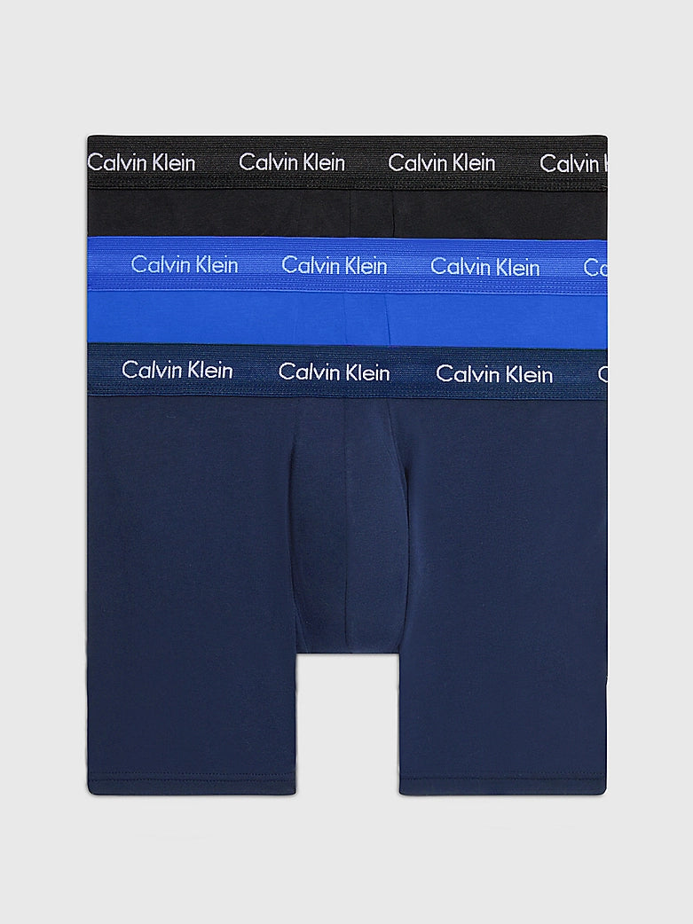 Calvin Klein #N/A front view of a 3 pack of pull-on boxer briefs in black, blue, and navy with signature elastic waistbands.