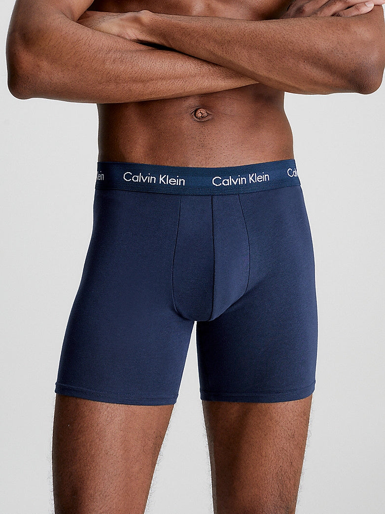 Calvin Klein #N/A front view of navy boxer briefs with signature elastic waistband