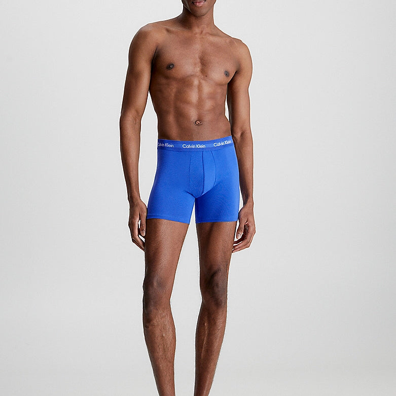 Calvin Klein #N/A boxer briefs in blue color shown on model from the front, featuring signature elastic waistband.